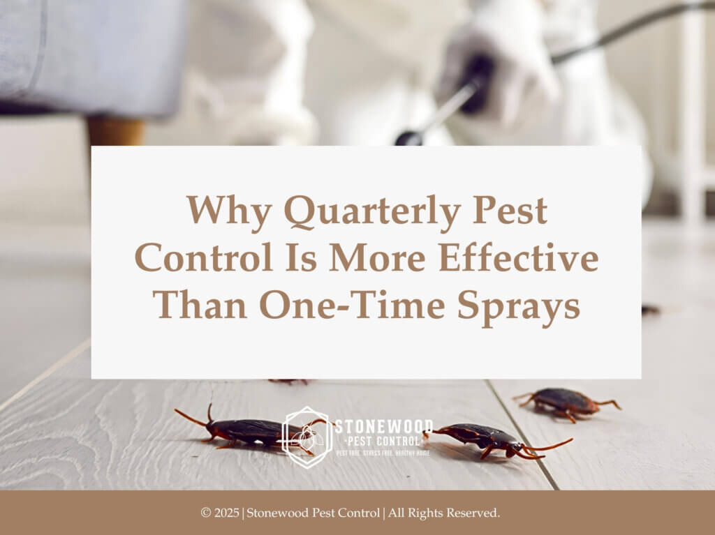 Pest control worker in protective gear sprays floor infested with cockroaches.